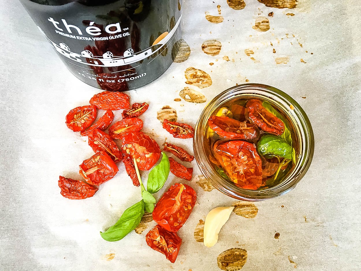 A plate of food on a table, with Sun-dried tomato