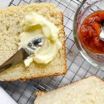 A piece of bread with a knife and fork