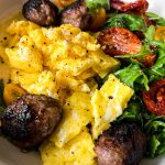 close up photo of creamy breakfast polenta with eggs
