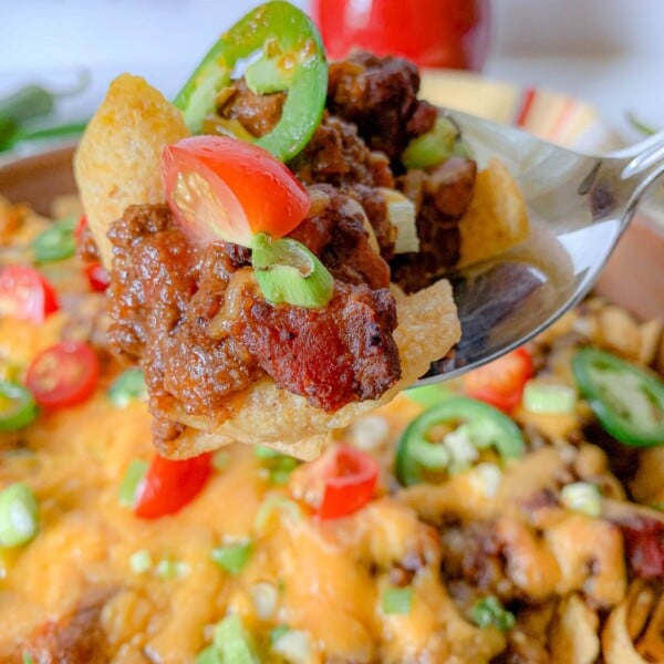 close up photo of Frito Pie Casserole on a spoon
