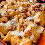 featured image for an apple and cinnamon cake in a casserole dish
