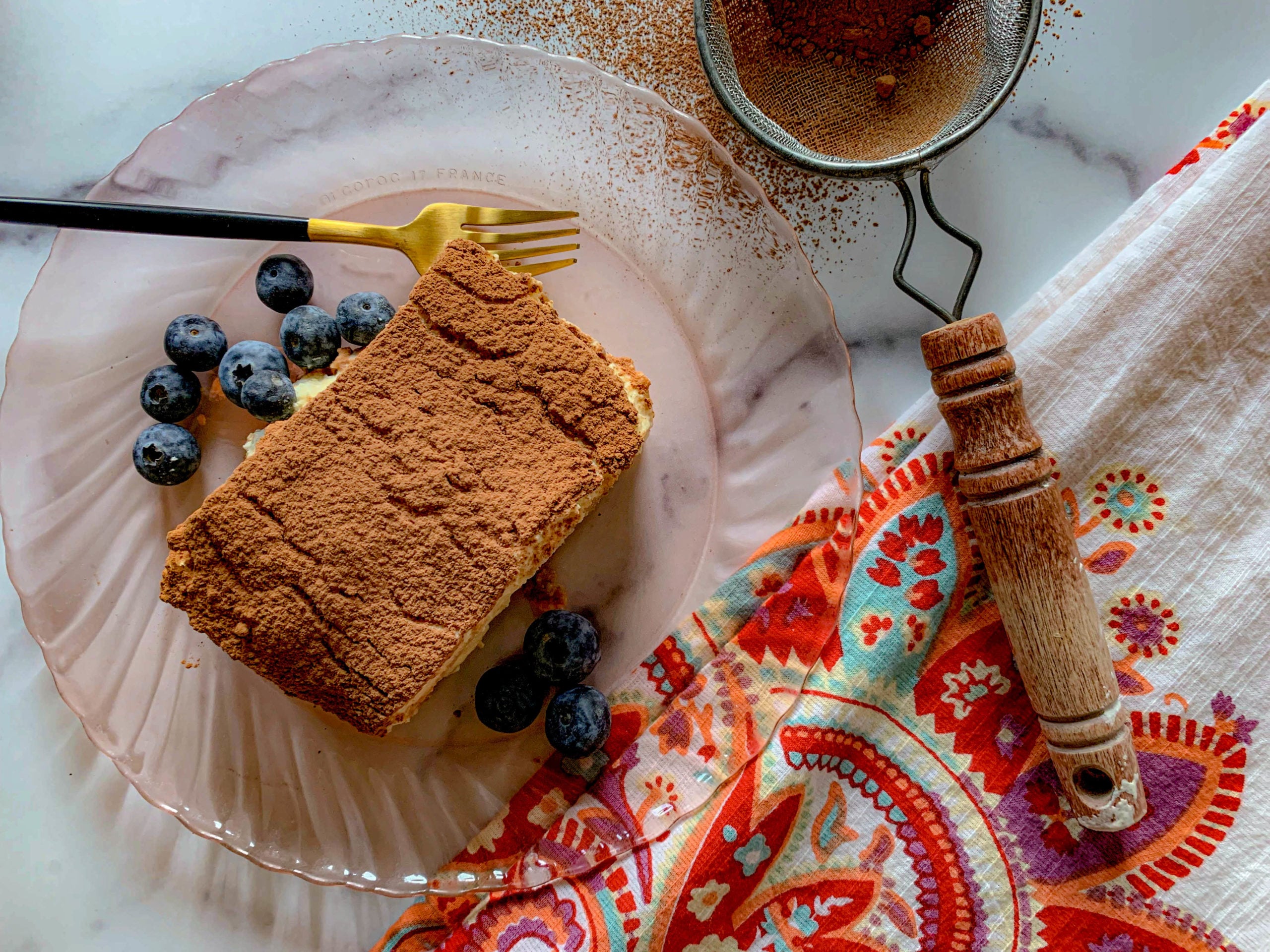 a white plate, with Tiramisu