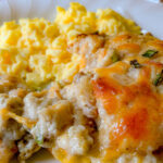 close up of a white plate, with Bob Evans Sausage Gravy Recipe and scrambled eggs