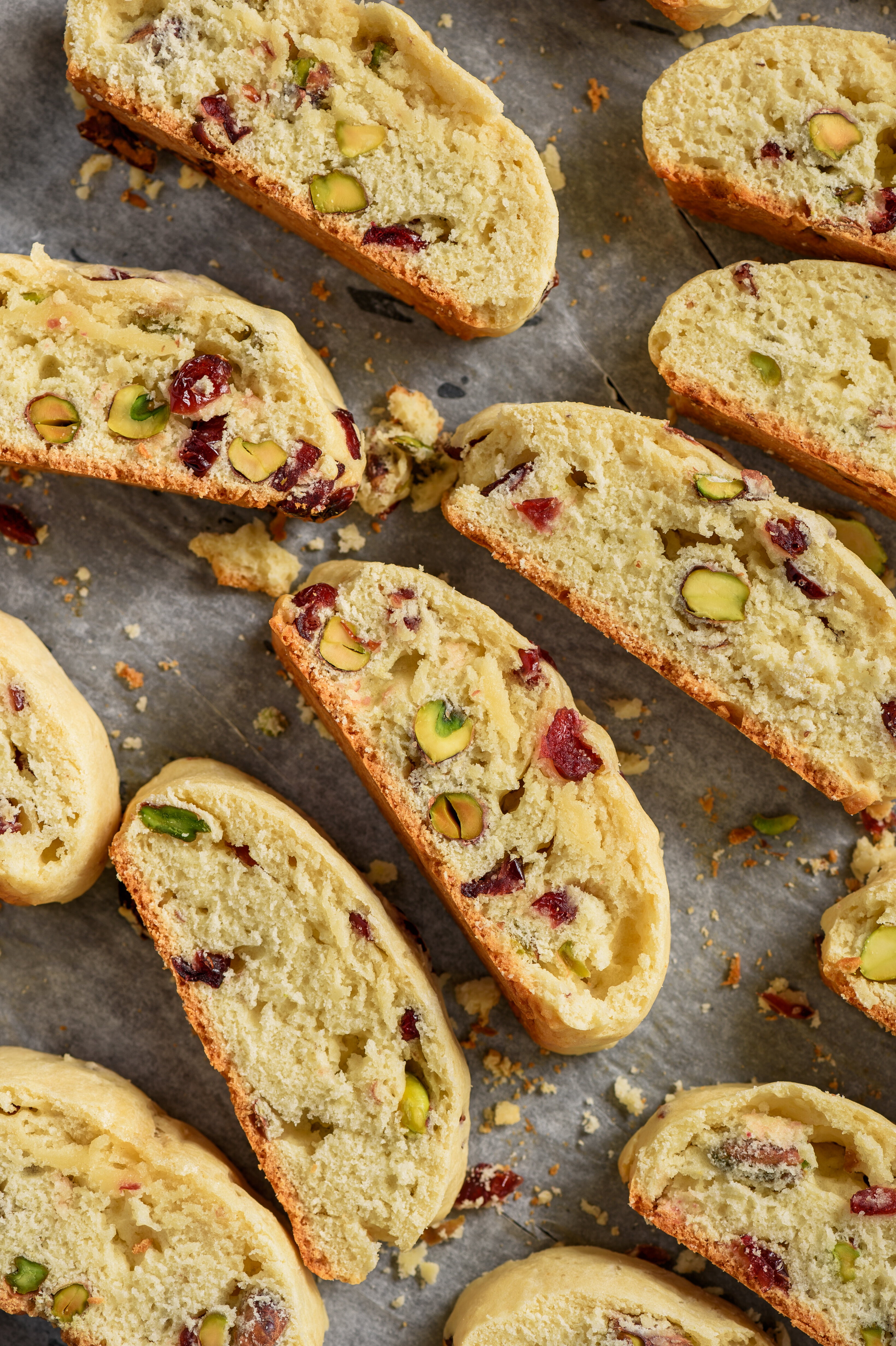 a baking sheet, with pistachio cranberry biscottis