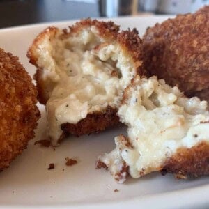 Zucchini Cheddar Hushpuppies - Two Lucky Spoons