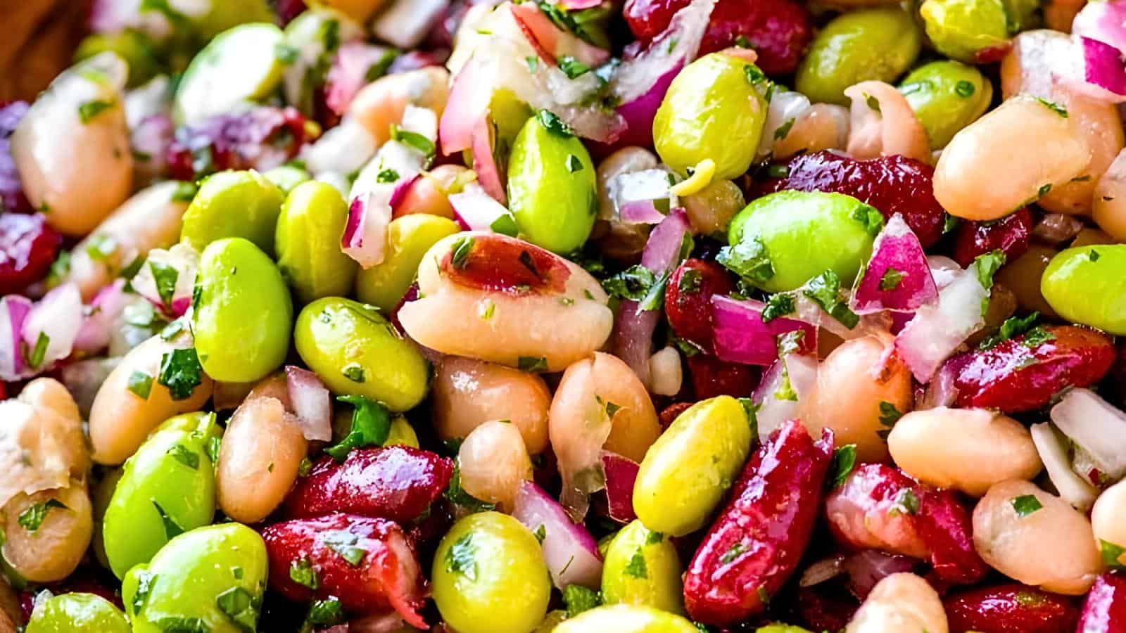 Kidney beans, edamame, cannellini beans, diced red onion, and herbs.