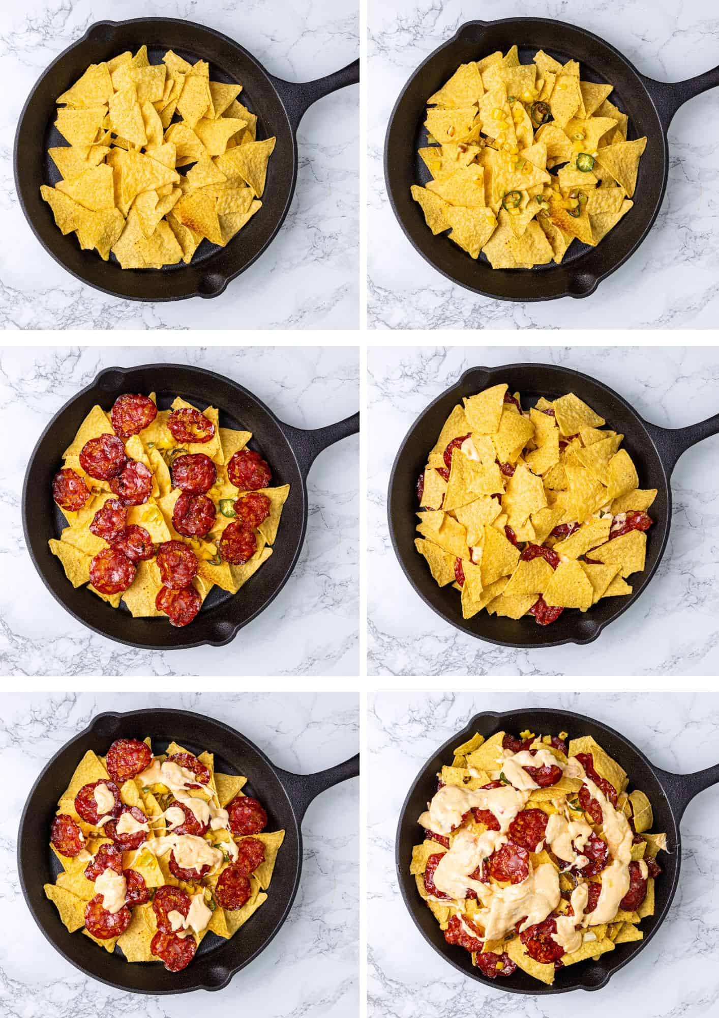 Tortilla chips, jalapeños, salsa, more chips, more salsa, and melted cheese in a cast iron pan on a marble surface.