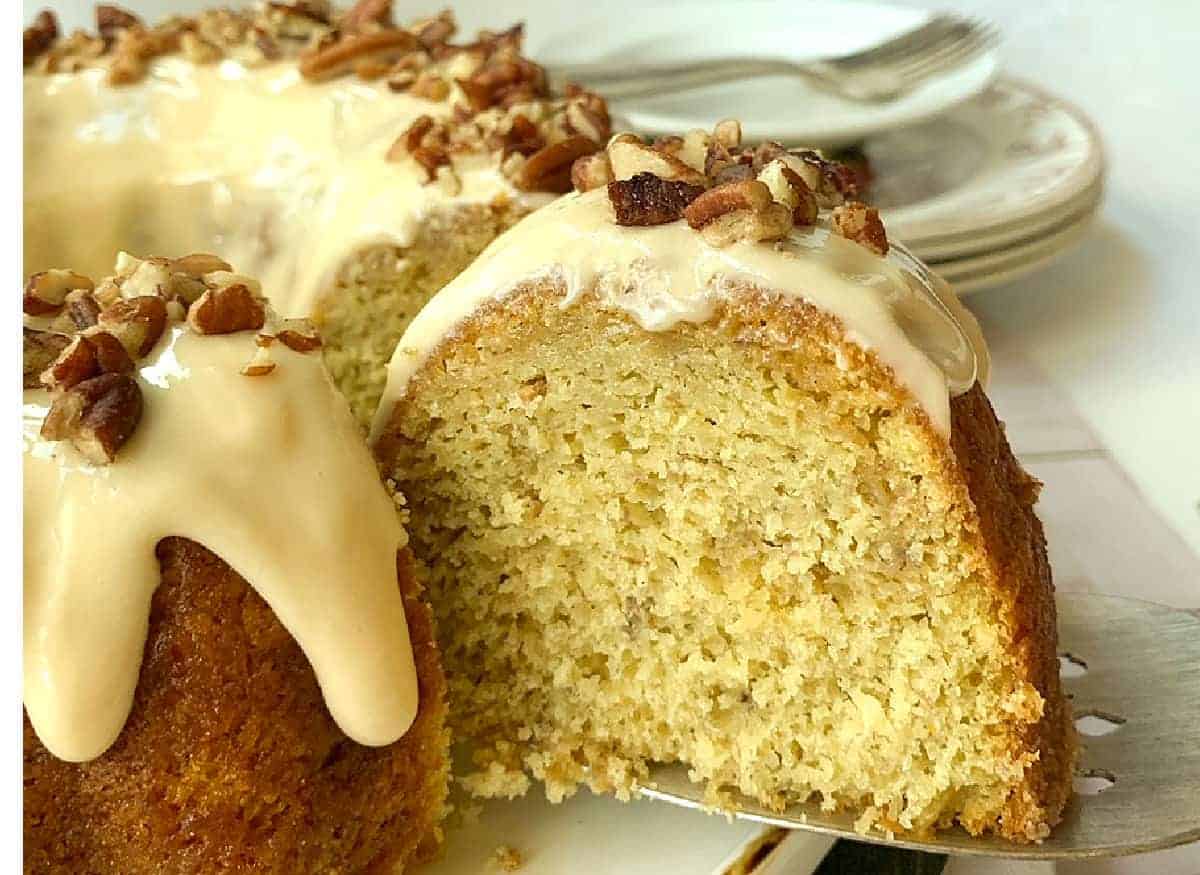 This Easy Banana Caramel Cake is tender and flavorful and it all starts with a boxed cake mix that tastes like it came from a high-end bakeshop.