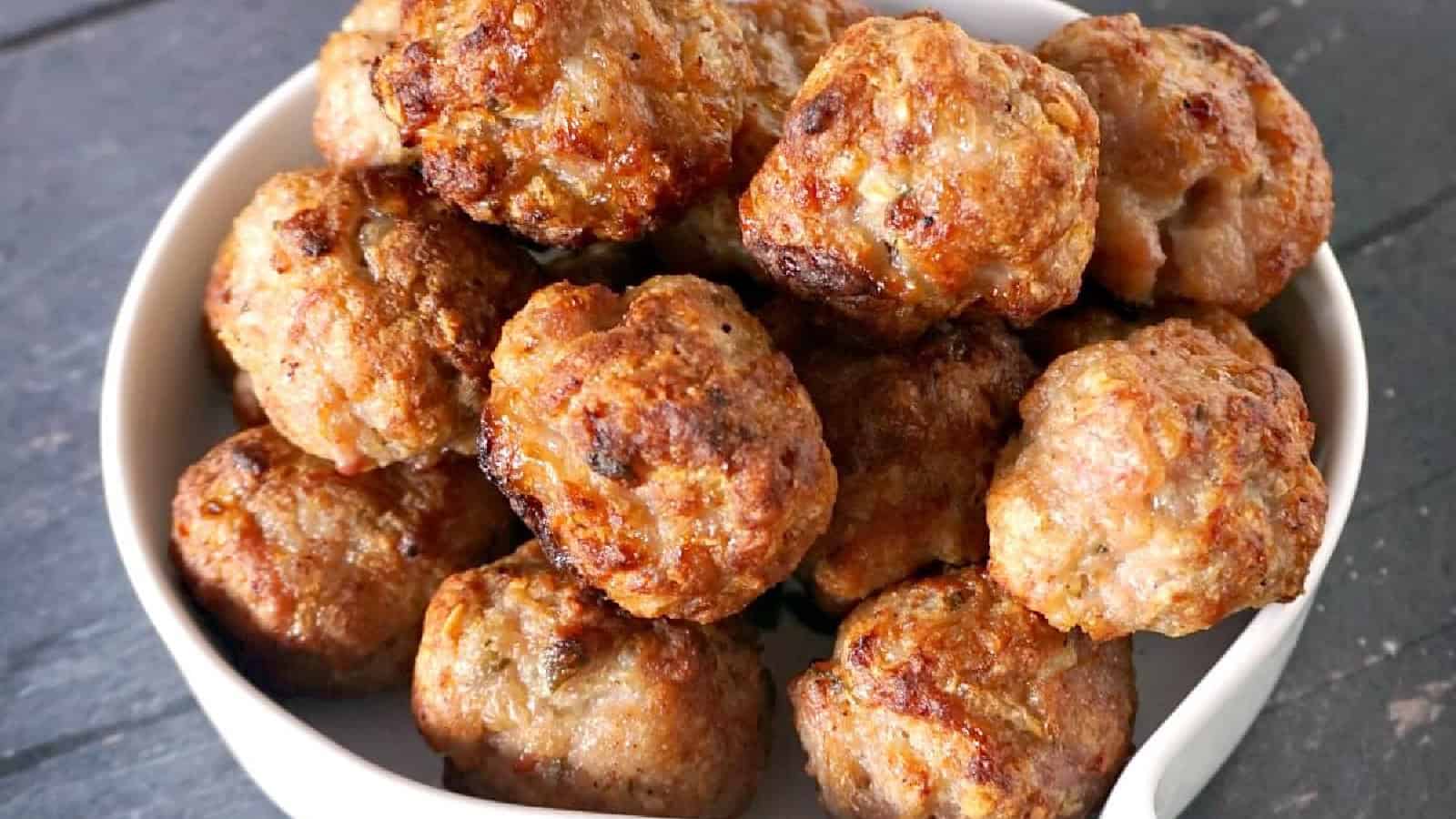 A bowl with sausage stuffing balls.