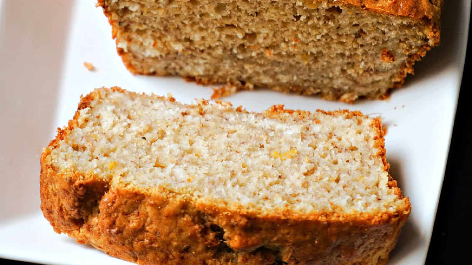 A slice of plantain bread cut out of the plantain loaf.