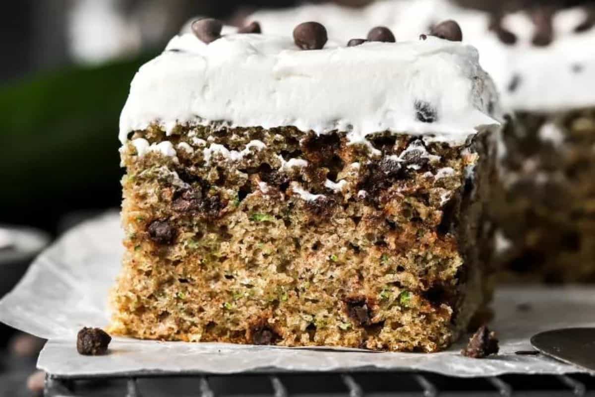Zucchini cake with chocolate chips and icing.