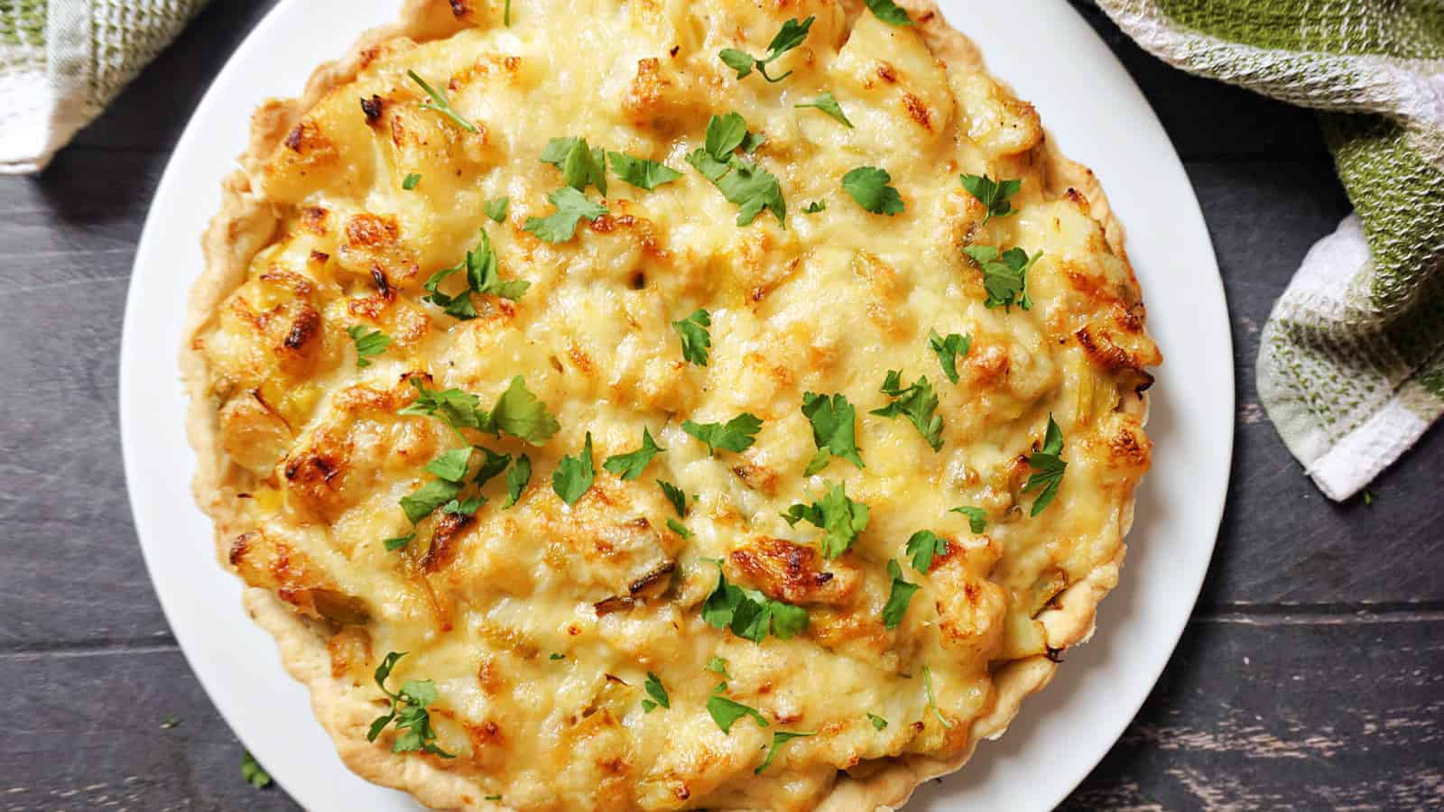 A homity pie on a white plate.