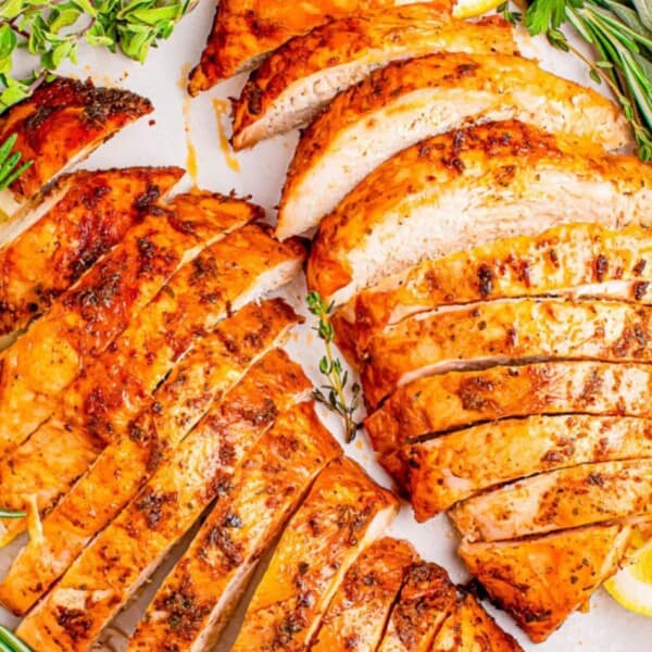 A succulent Thanksgiving turkey accompanied by an assortment of classic sides, creating a festive holiday feast.