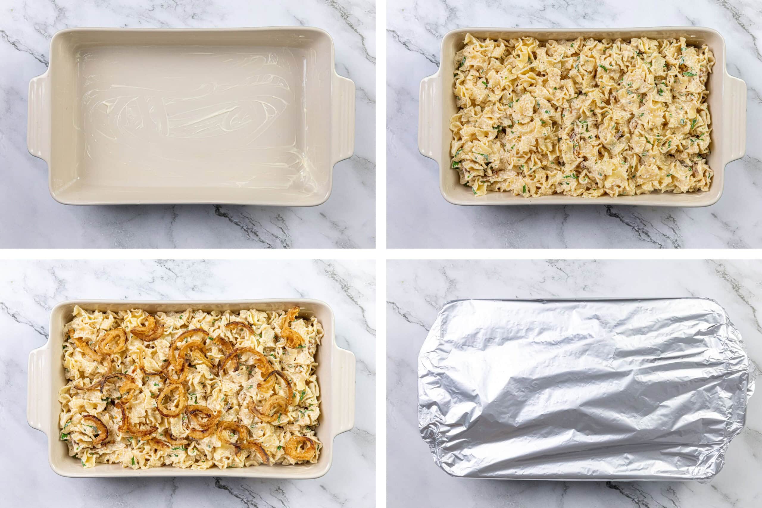 Greased baking dish, noodle mixture, sliced onions on top, aluminum foil covering, all placed on a marble countertop.