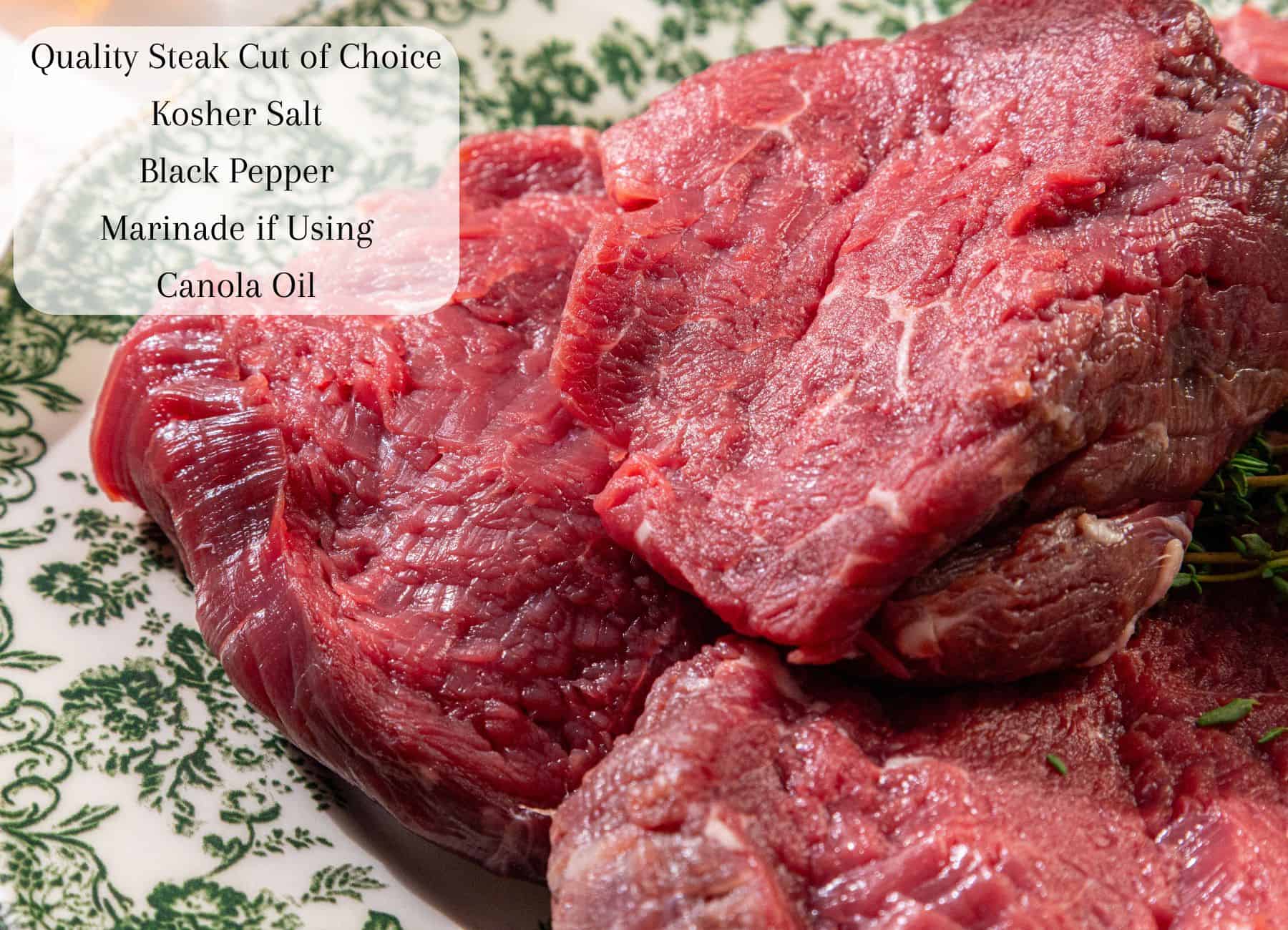 Raw steak cuts on a decorative plate, with a text overlay listing: quality steak, kosher salt, black pepper, marinade, canola oil.