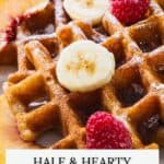 Waffles topped with banana slices, raspberries, and peach slices. Text: "Not Entirely Average" and "Hale & Hearty Waffles.